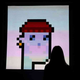 A woman looks at an NFT by Larva Labs titled ‘CryptoPunk 7523’ at Sotheby’s in June 2021.